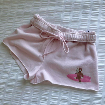 Curious George Surfer Sweat Shorts — Blush Pink